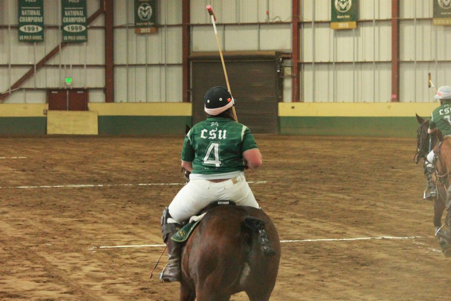 Team player number 4 heads towards the center of the arena.