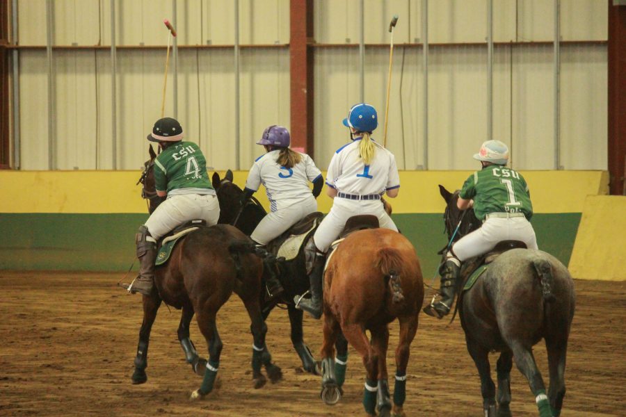 Players race against each other as they head towards CSU’s goal.