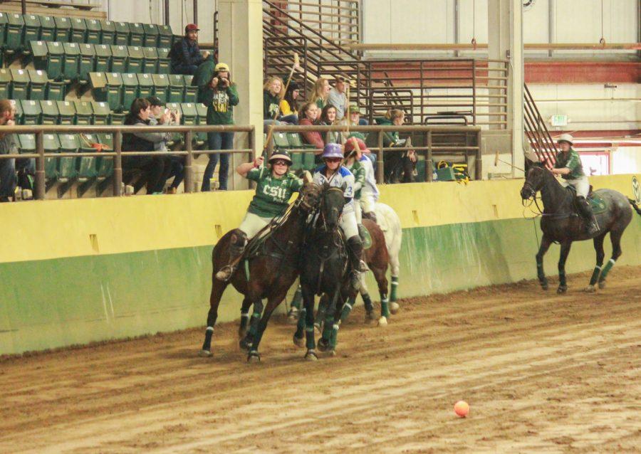 Player number 4 tries to push the opposing player out of the way.
