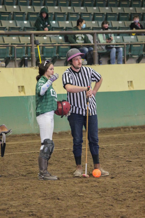 A CSU player discusses the game with the referee.
