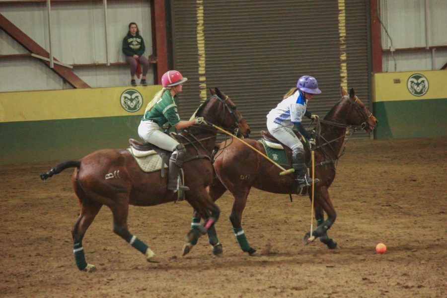 A CSU player tries to get the ball from the opposing team