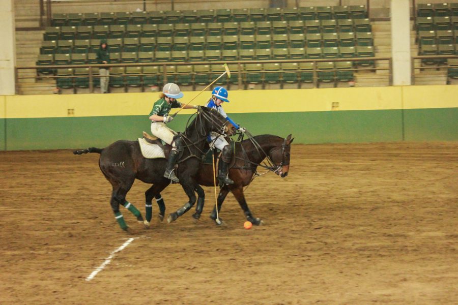 A CSU player goes to take the ball away from the opposing team.