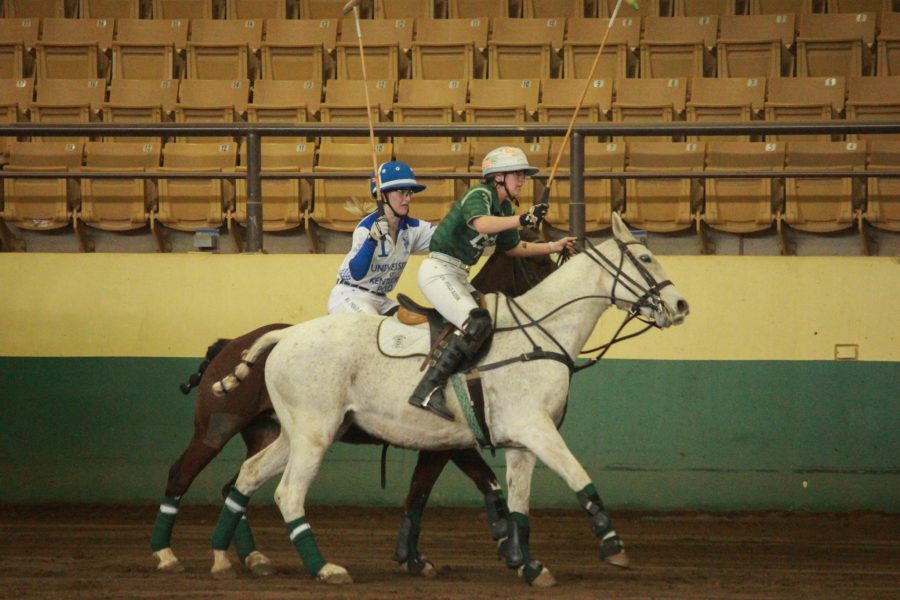 Two players race each other to the ball