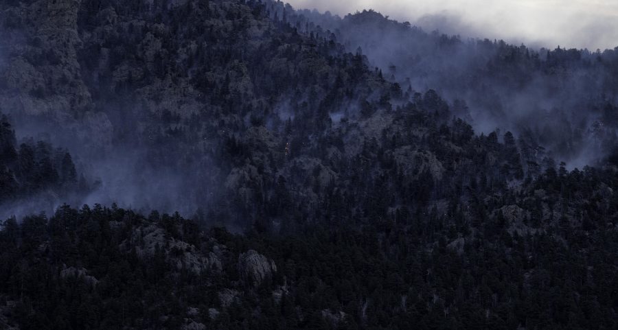 The Kruger Rock fire burning Southeast of Estes Park Colorado Nov. 16. At the time of the photo the fire was approximately 15% contained spreading across approximatley 115 acres. (Garrett Mogel | The Collegian)