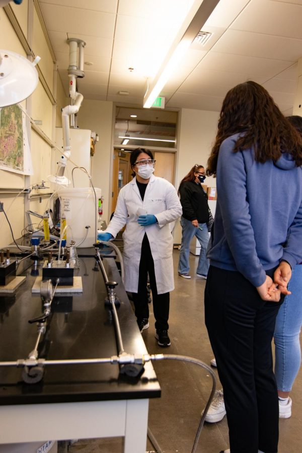 Shinyun Park, a civil and environmental engineering student at Colorado State University, explains how water is purified through a specific membrane using reverse osmosis to turn salt water into drinking water to the Red Cloud Indian School students Nov 20. The students are from the Pine Ridge reservation in South Dakota and were shown a tour of campus leading them to the Little Shop of Physics. (Grayson Reed |The Collegian)