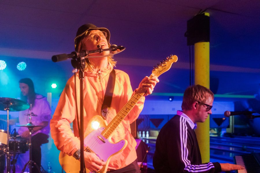 Steven Hartman, Jakob Mueller and Oliver Mueller perform at Chipper's Lanes