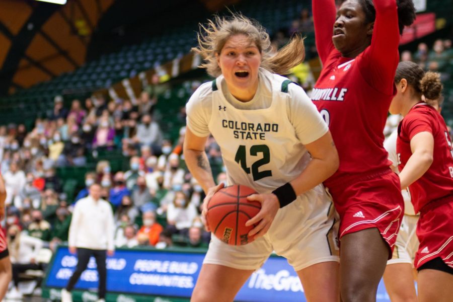 Karly Murphy(42) Colorado State Ram searching for a teammate to pass the ball to during a fiery game against the Louisville Cardinals Nov. 28.