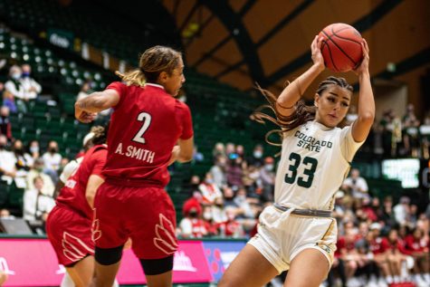 Bengisu Alper (33) Colorado State Ram receiving the ball after a pass from her team mate during a game against the Louisville Cardinals.