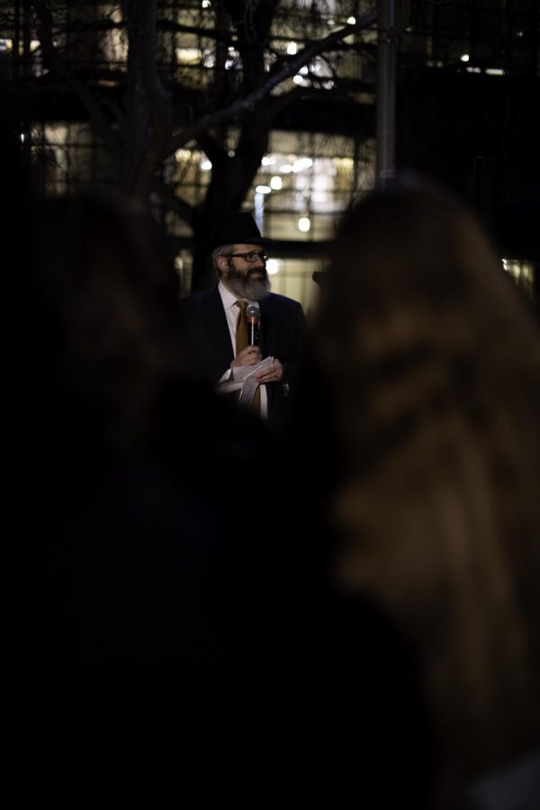 Rabbi Yerachmiel Gorelik speaks during the lighting of the Menorah for the third day of Hanukah on the Lory Student Center Plaza Fort Collins Colorado Nov. 30.