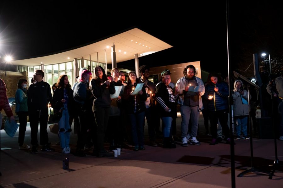 Participants hold candles and sing Hebrew songs in celebration of the third night of Hanukkah in the Lory Student Center Plaza, Fort Collins Colorado Nov. 30. The celebration was organized by the Chabad Jewish Student Organization co-sponsored by the LSC, RHA, President’s Office. (Milo Gladstein | The Collegian)