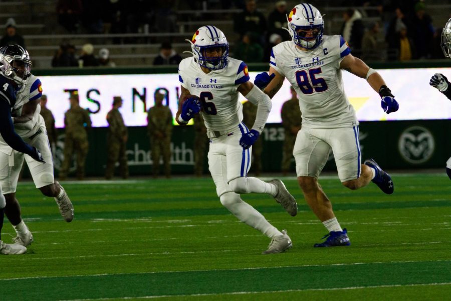 Colorado State wide receiver Ty Mccullouch (6) runs the ball upfield as tight end Trey Mcbride (85) runs ahead of him to block Nov. 27.