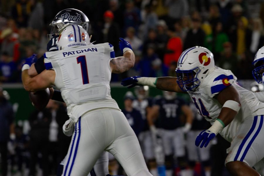 Colorado State defensive lineman Scott Patchan (1) sacks Nevada quarterback Carson Strong (12) Nov. 27