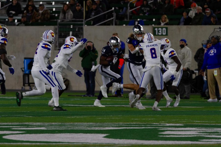 Nevada Wide Receiver Tory Horton (14) runs up field after catching a pass as colorado State defenders pursue Nov. 27.