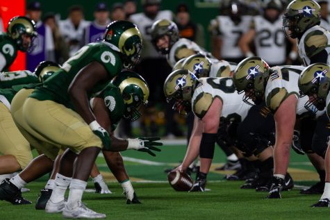 The offensive and defensive lines of the United States Air Force Academy and Colorado State University line up Nov. 13. The Rams lost to the Falcons 35-21, marking their fifth straight loss to the Falcons. (Gregory James | The Collegian)