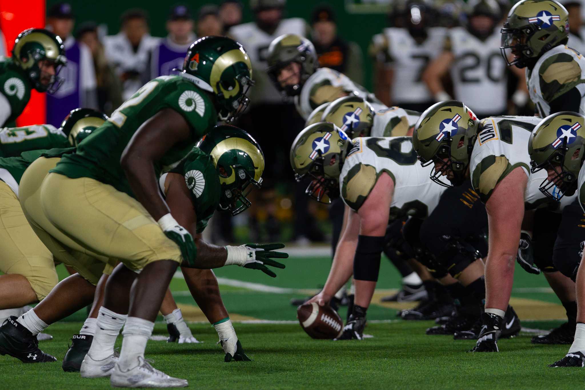 The offensive and defensive lines of Air Force Academy and Colorado State Nov. 13.