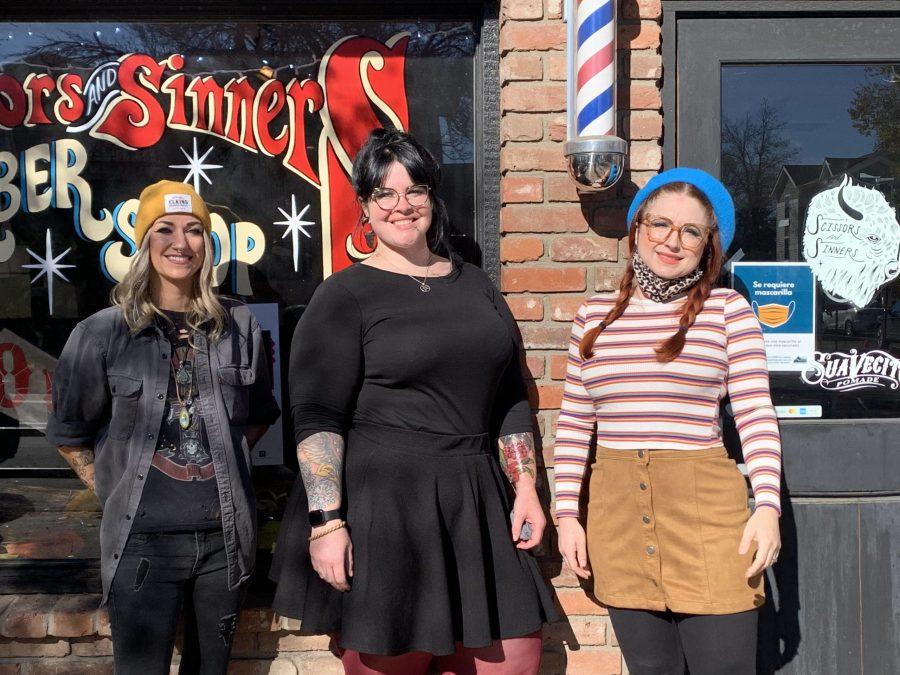 Three of Scissors and Sinners Hair outlaws Tabitha Petersen, Mikki Maddalena and Rachel Reed pose outside the shop Nov. 8. (Kota Babcock | The Collegian)