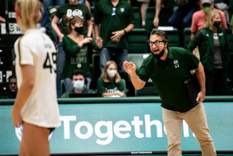 Colorado State University volleyball Head Coach Tom Hilbert coaches players from the bench in the second set Nov. 6. (Photo by Lucy Morantz)