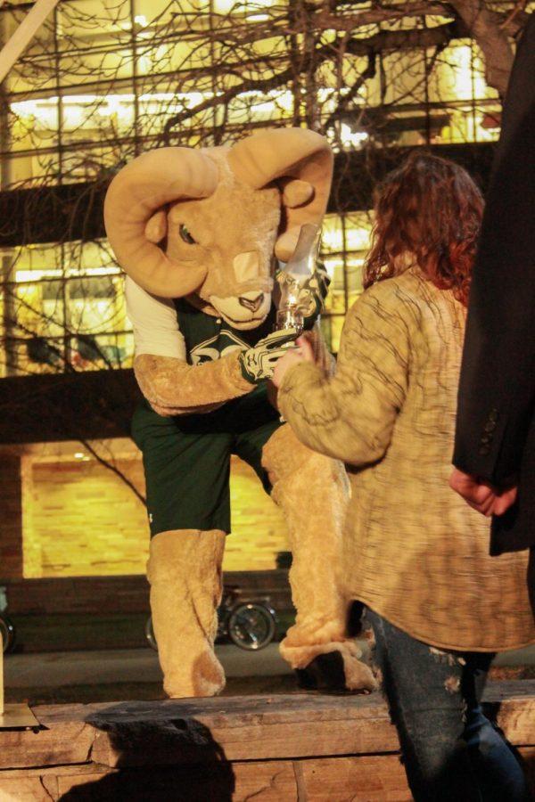 Cam the ram helps light the Menorah