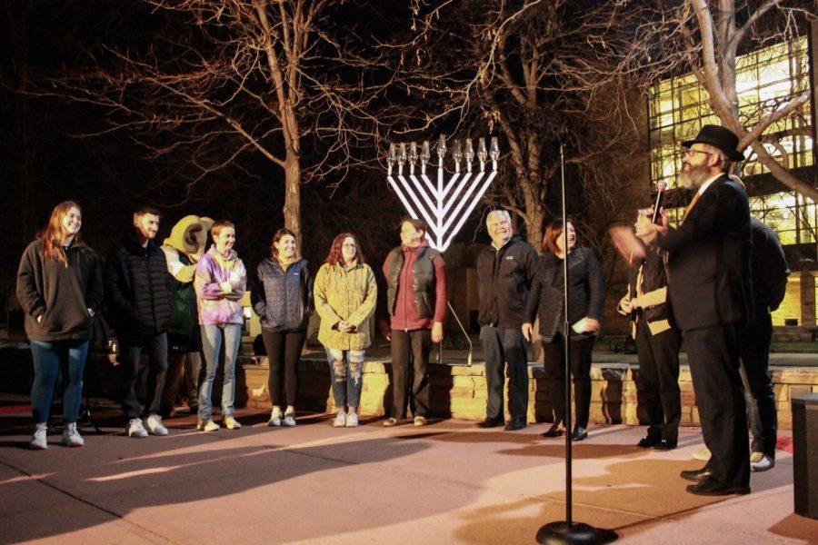 People gathered at the Lory Student Center Plaza to celebrate the third night of Chanukah