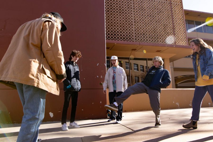 Colorado State University students enjoy a game of Hackey Sack between classes in front of Clark building C Dec 7.