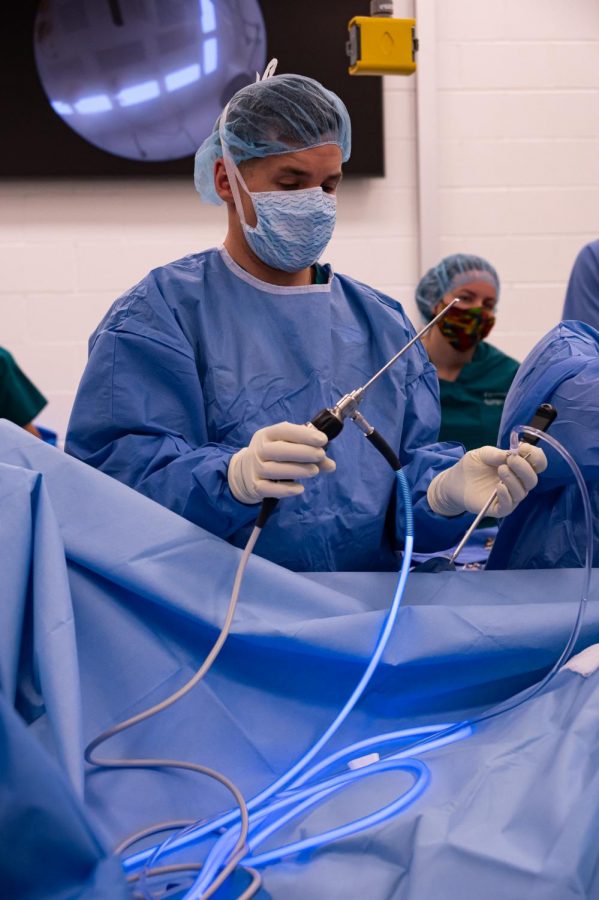 Dr. Tom O’Brian prepares the video camera for surgery at The Johnson Family Equine Hospital