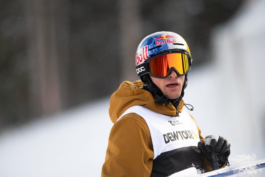 Nick Goepper stands at the base of the ski slopestyle course before finals start