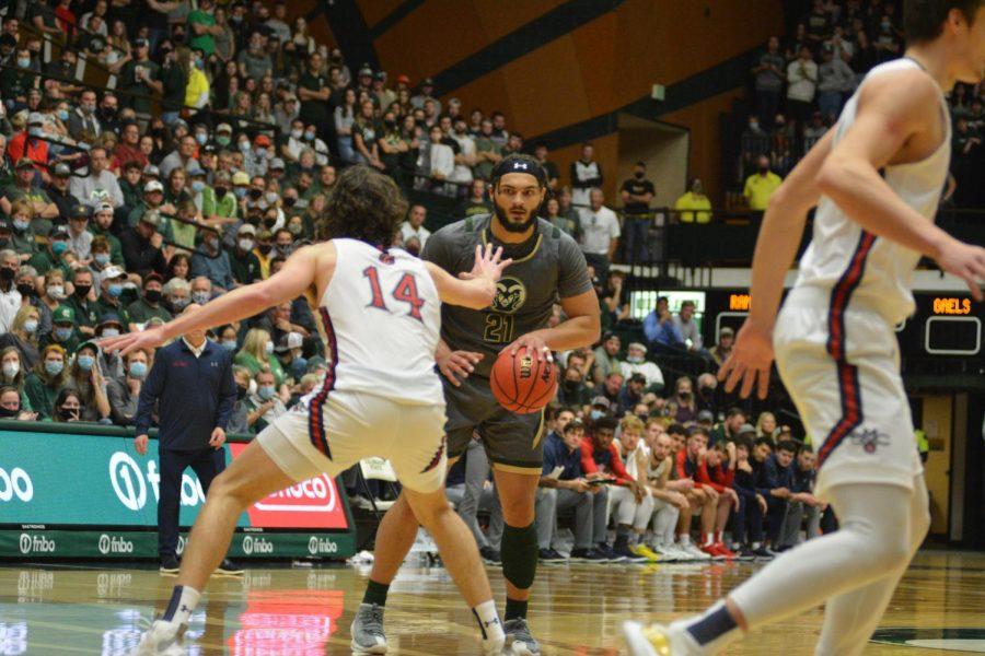 Colorado State forward David Roddy (21) prepares to dribble past St. Mary's forward Kyle Bowen (14) Dec. 4.