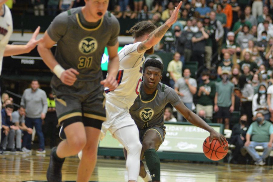 Colorado State guard Isaiah Stevens (4) crosses St. Mary's defender Logan Johnson (0) Dec. 4.