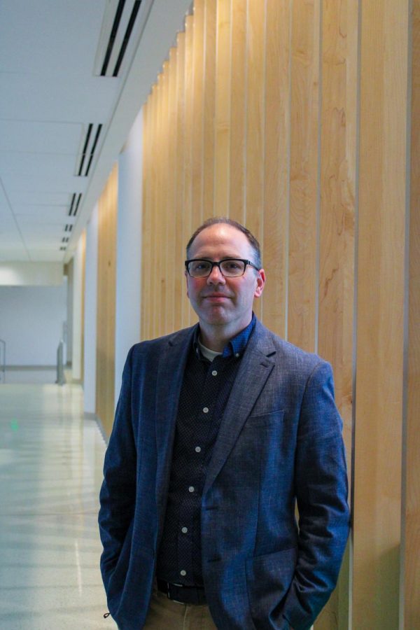Tom Dunn poses for a head shot in the Lory Student Center.