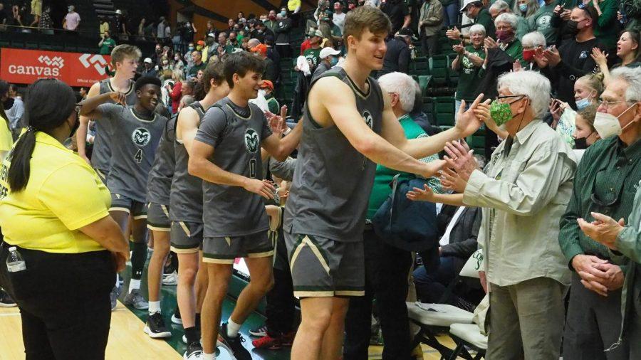 Members of the Colorado State men's basketball team high five members of the crowd after beating the St. Mary's Gaels Dec. 4.