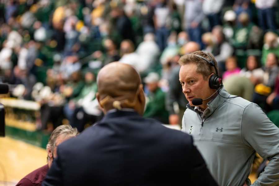 Colorado State University mens basketball Head Coach Niko Medved participates in a half-time interview