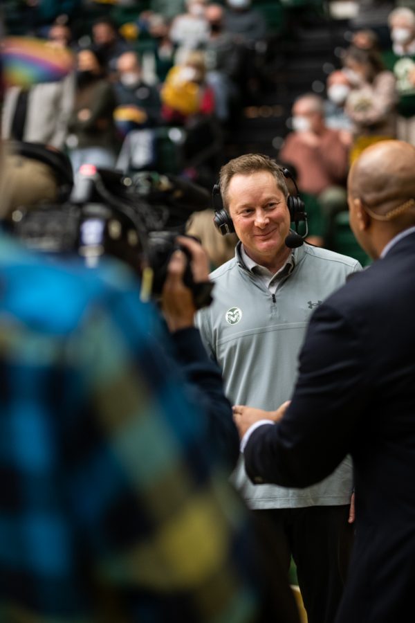Colorado State University mens basketball Head Coach Niko Medved participates in a half-time interview