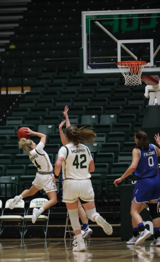 Colorado State University guard McKenna Hofschild (4) attempts a jump shot against the Air Force Academy Falcons January 13, 2022. CSU lost to Air Force 52-77.