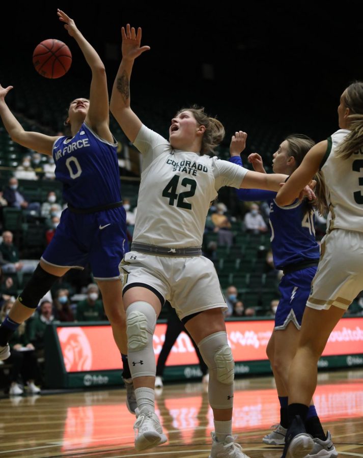 Forward Karly Murphy (42) attempts to rebound the ball during Colorado State Universitys game against the Air Force Academy January 13, 2022. CSU lost the contest 52-77.