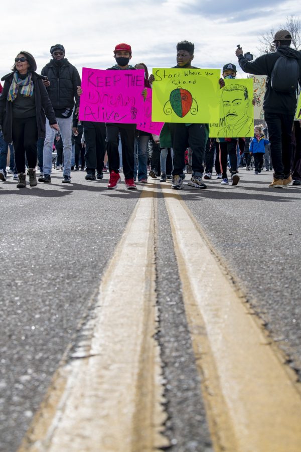 Participants of the Martin Luther King day celebration march down Meldrum Street in Fort Collins Colorado from City Hall toward Colorado State University Campus Jan. 17.
