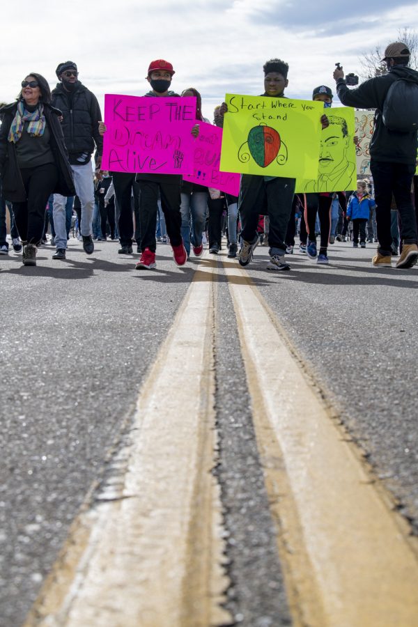 Participants of the Martin Luther King day celebration march down Meldrum Street in Fort Collins Colorado from City Hall toward Colorado State University Campus Jan. 17. The mile long march was escorted by Fort Collins Police and featured keynote