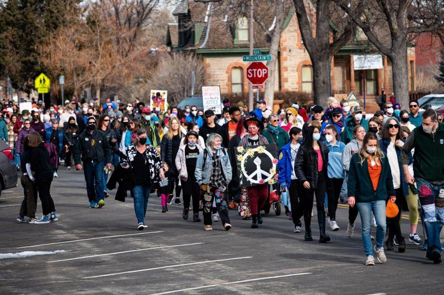 Participants in the Martin Luther King day celebration march down Howes Street in Fort Collins, CO. Jan 17.