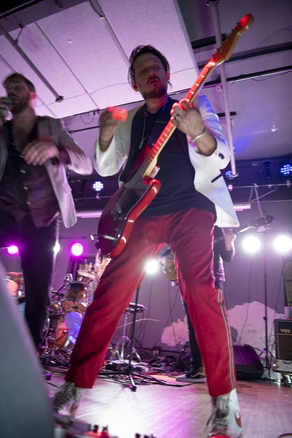 Cole Male, guitarist for the Unlikely Candidates plays one of the band's songs at The Coast in Fort Collins Colorado Jan. 19. 22