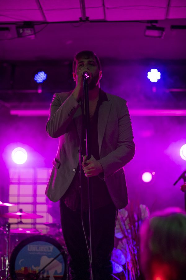 Kyle Morris, Lead Singer of the Unlikely Candidates begins to sing one of the band's songs at The Coast in Fort Collins Colorado Jan. 19. 22.