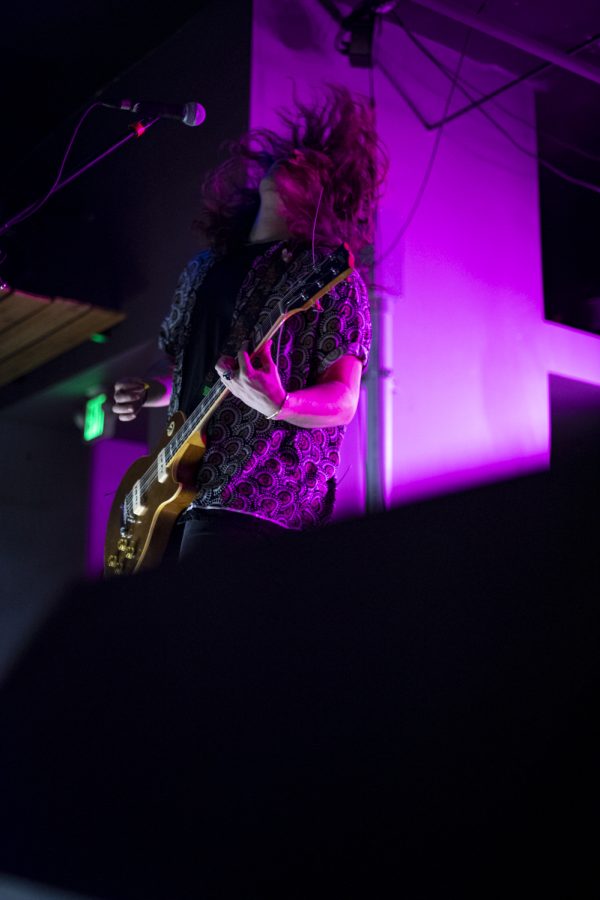 Brenton Carney, guitarist for the Unlikely Candidates plays one of the band's songs at The Coast in Fort Collins Colorado Jan. 19. 22