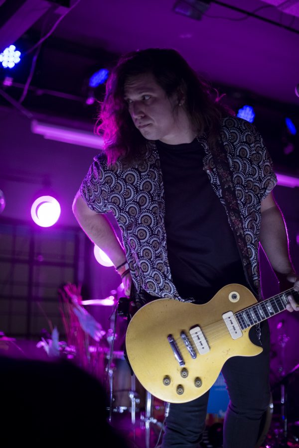 Brenton Carney, guitarist for the Unlikely Candidates plays one of the band's songs at The Coast in Fort Collins Colorado Jan. 19. 22