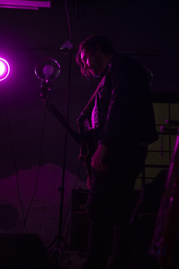 Bassist for the Unlikely Candidates, Jared Hornbeek, headbangs while playing one of the band's songs at The Coast in Fort Collins Colorado Jan. 19. 22