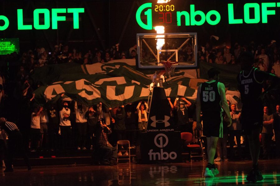 Colorado State Rams fans cheering on their team during the intro to the Nevada Wolfpack game.