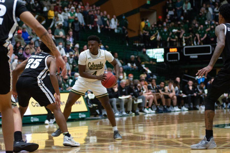 Isaiah Stevens (4) dribbling down the court on offense during the game against the Nevada Wolfpack.