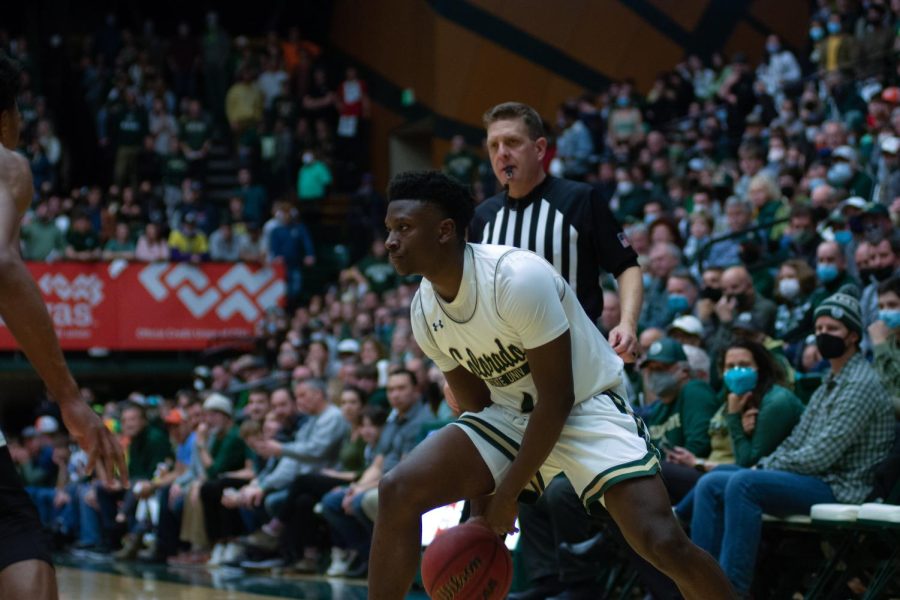 Isaiah Stevens (4) dribbling down the court on offense during the game against the Nevada Wolfpack.