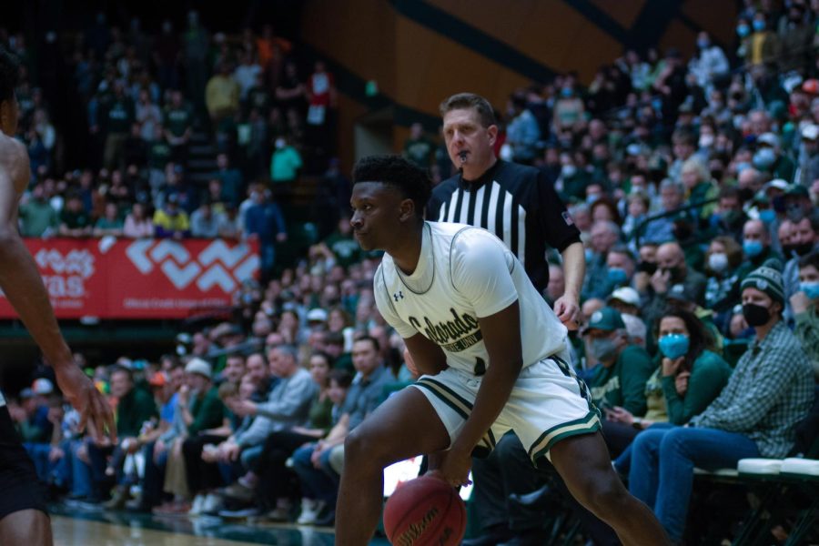 Isaiah Stevens (4) dribbling down the court on offense during the game against the Nevada Wolfpack.