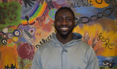 David Aggrey Colorado State University honorable Football player smiling in the Black African American Culture Center.