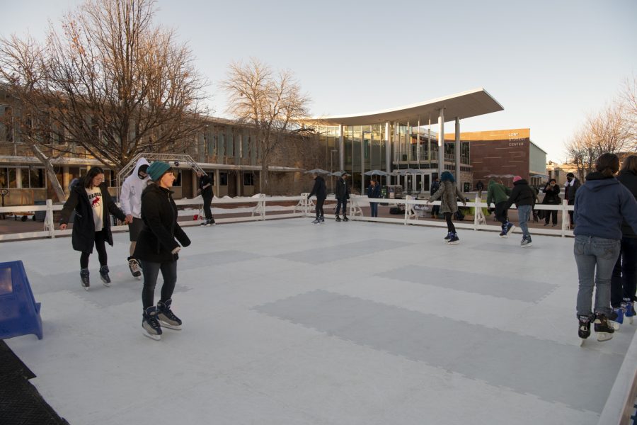 Colorado State University students skate on a temporary ice rink outside the CSU Lory Student Center Plaza Jan. 27. 22