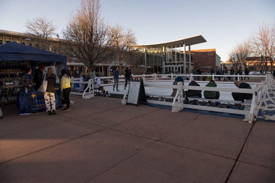 Colorado State University students skate on a temporary ice rink outside the CSU Lory Student Center Plaza Jan. 27. 22