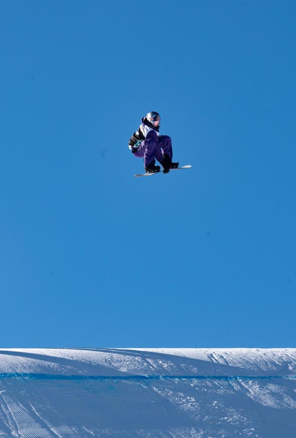 Mark McMorris grabs his board as he hits the last kicker in men’s slopestyle finals at Dew Tour